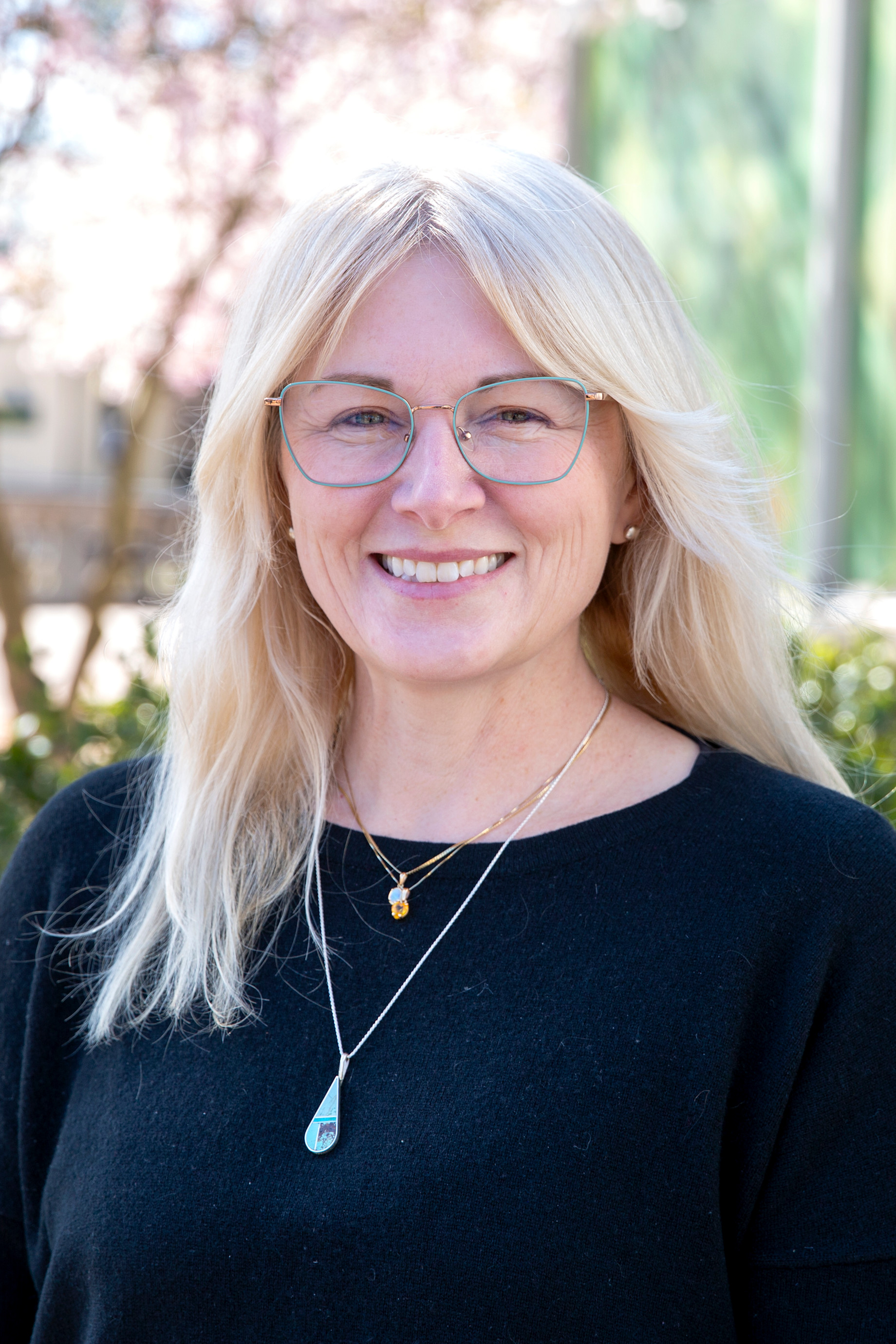 A headshot of Dr. Copper Aitken-Palmer