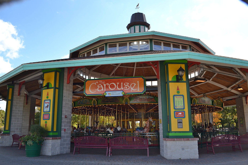 The exterior of the carousel, showing the animal-shaped seats. 