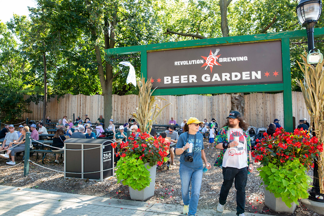 An outdoor beer garden at the zoo. 