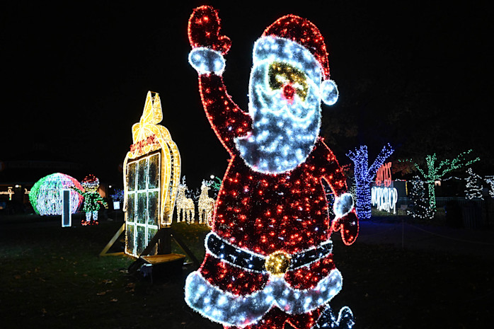 Holiday lights showing Santa and a tic-tac-toe board featured. 