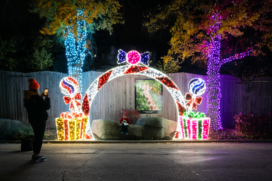 An arch of lights that look like candy. 