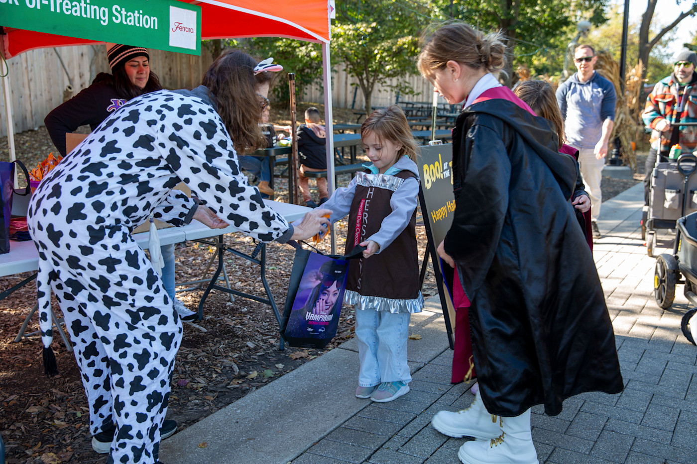 Children trick-or-treat at Boo! at the Zoo